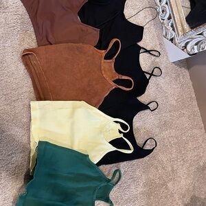 Free People Camisoles in Black, Brown, Yellow, and Green